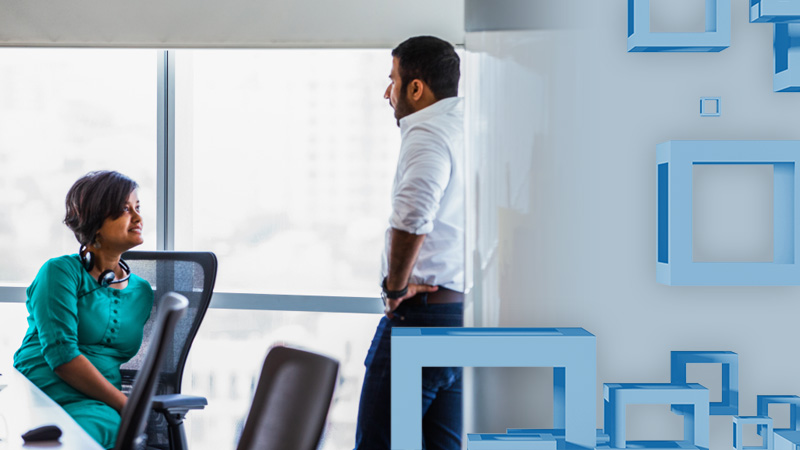 Two people in a business meeting