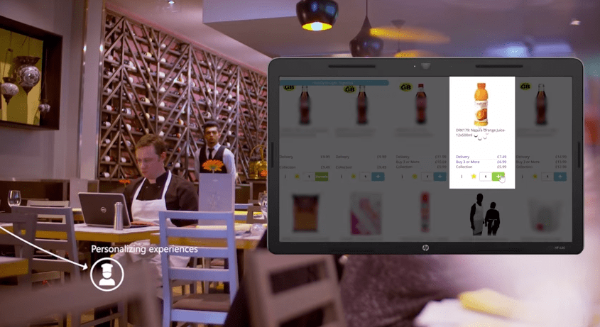 A restaurant staff checking the inventory on a laptop screen