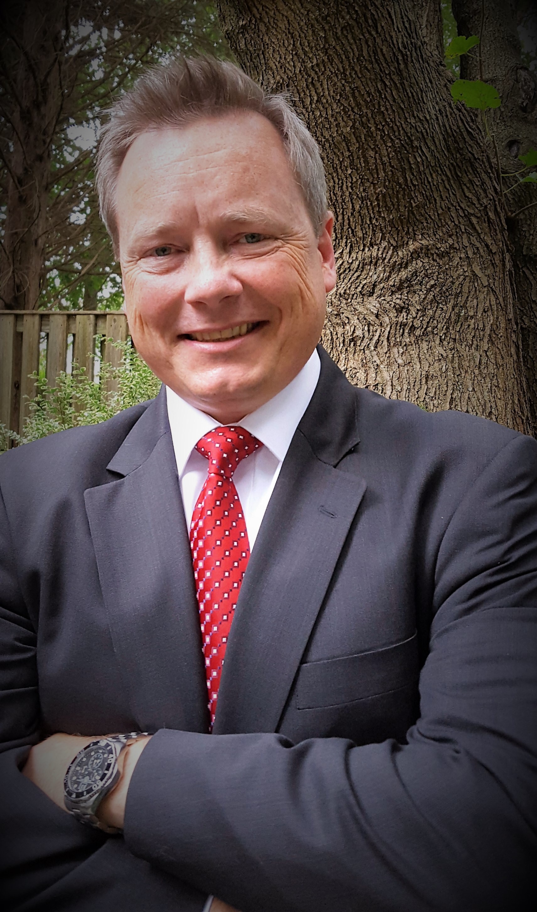 a man wearing a suit and tie