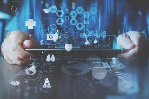 Healthcare provider holding a tablet