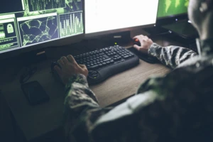 a man lying on the keyboard of a laptop computer