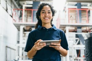 A woman holding a tablet