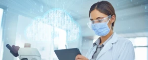 doctor taking notes on tablet