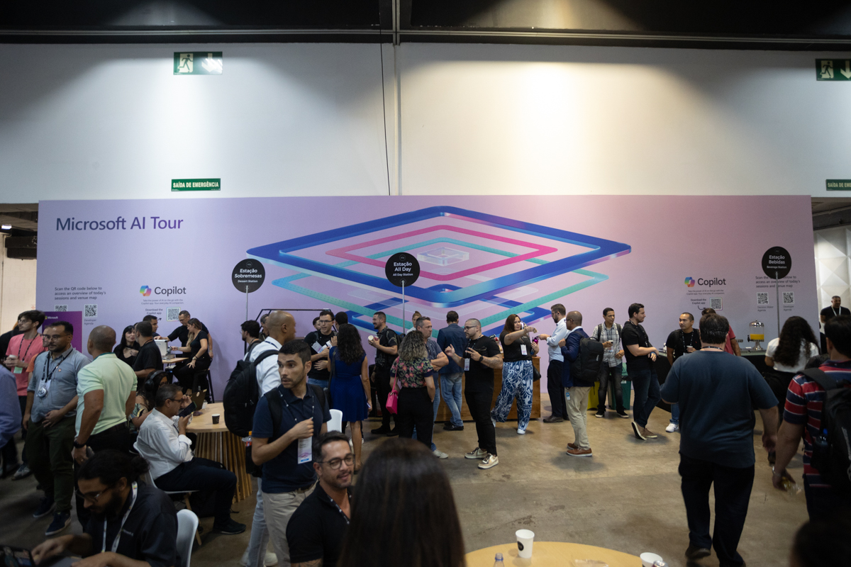 Attendees at The Microsoft AI Tour stop in São Paulo, Brazil view demonstrations of Microsoft Copilot