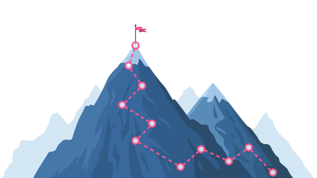 Path up a mountain with flag on top
