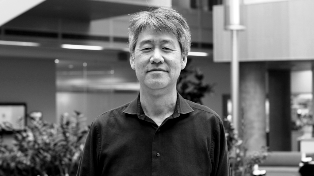 Peter Lee smiling at the camera