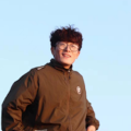 a man smiling for the camera