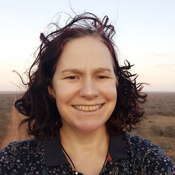 a woman smiling for the camera
