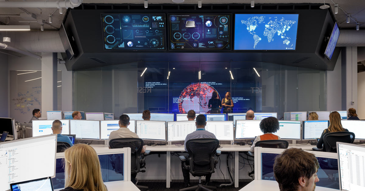 Image of tech workers in their office.