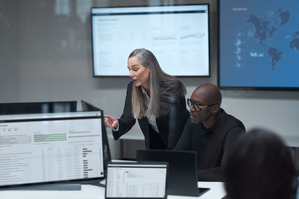 Practitioner and CISO collaboration in a security war room.