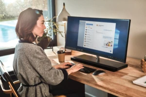 a person sitting in front of a computer