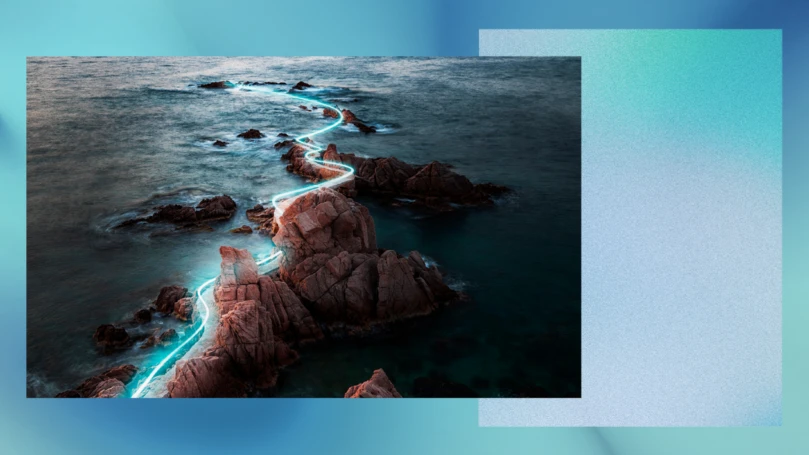 Decorative image of a rocky peninsula and ocean on a blue and green color block background.