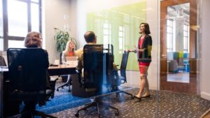 Stock photo of employees having a meeting.